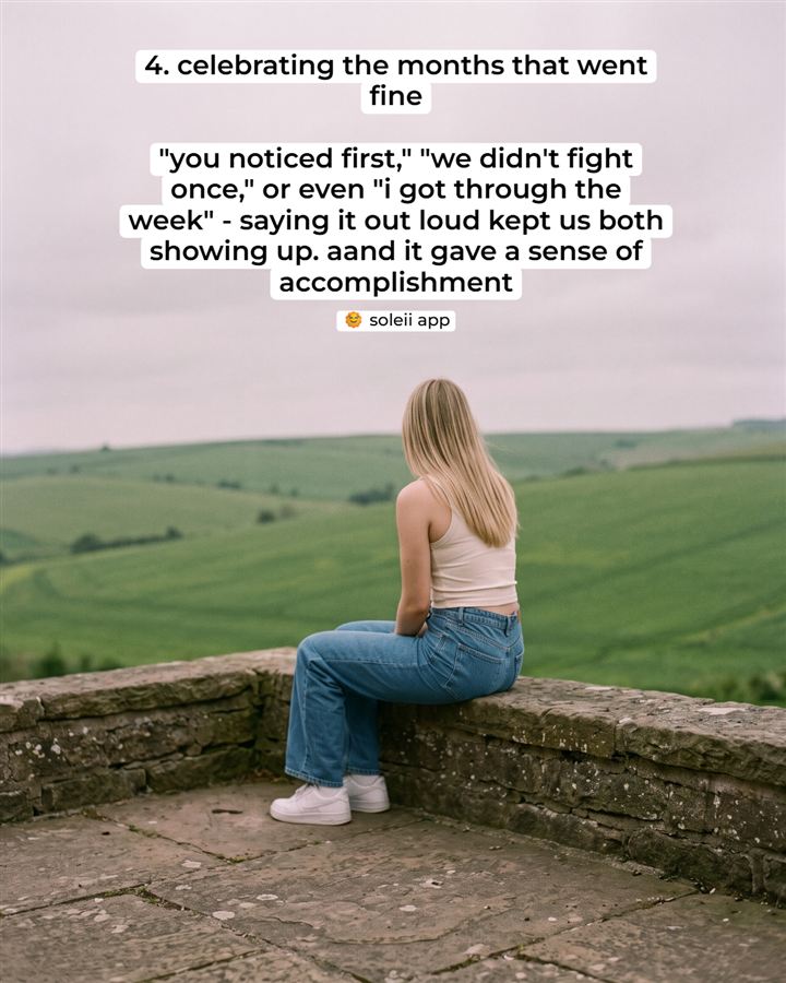 A stone terrace looking out over green hills. '4. celebrating the months that went fine. saying it out loud kept us both showing up.'